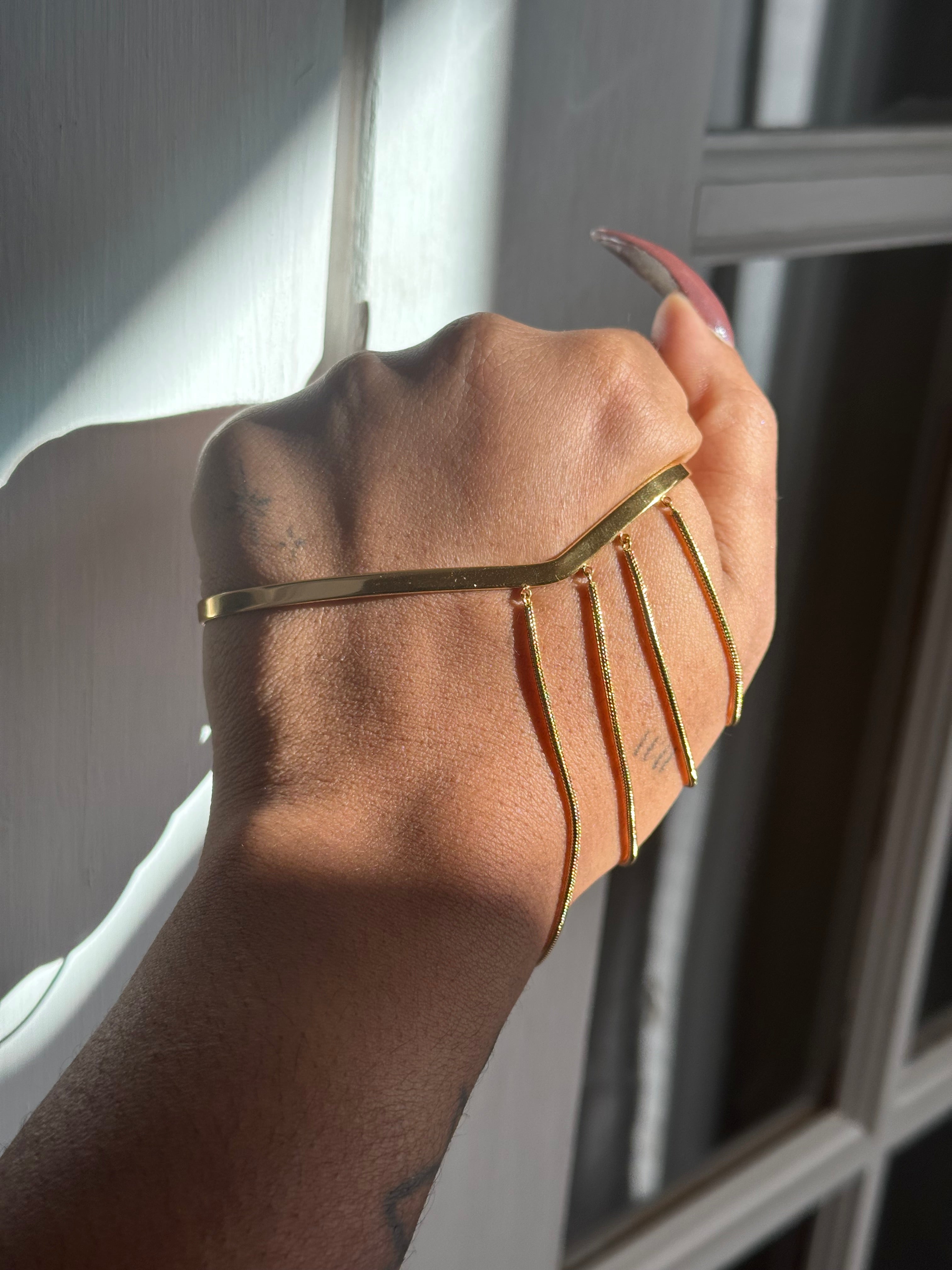 “Draped in Gold” Hand Cuff