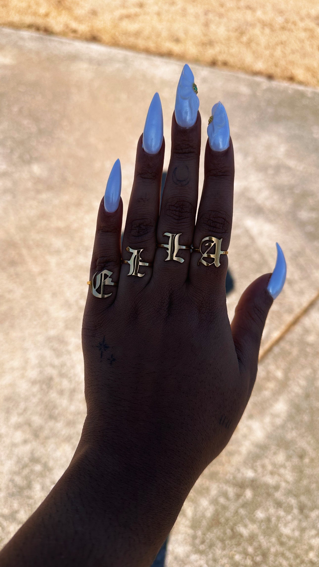 “Initially” Ring